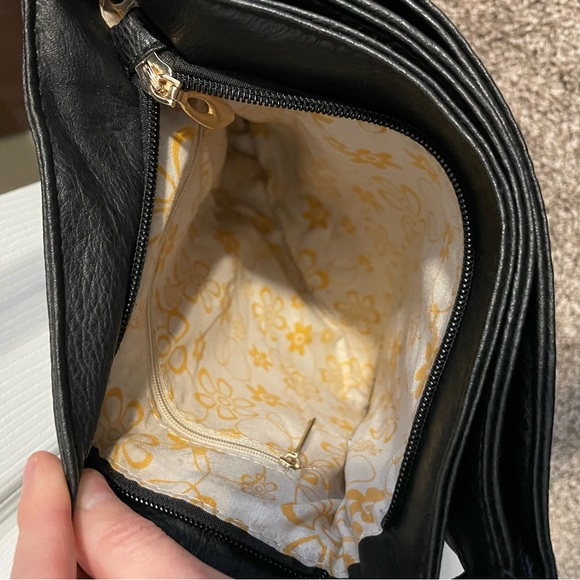 Black Crossbody Purse with Gold colored accents. - Picture 9 of 10